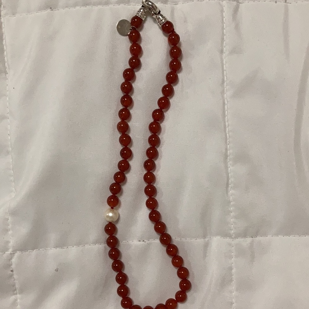 One pearl necklace